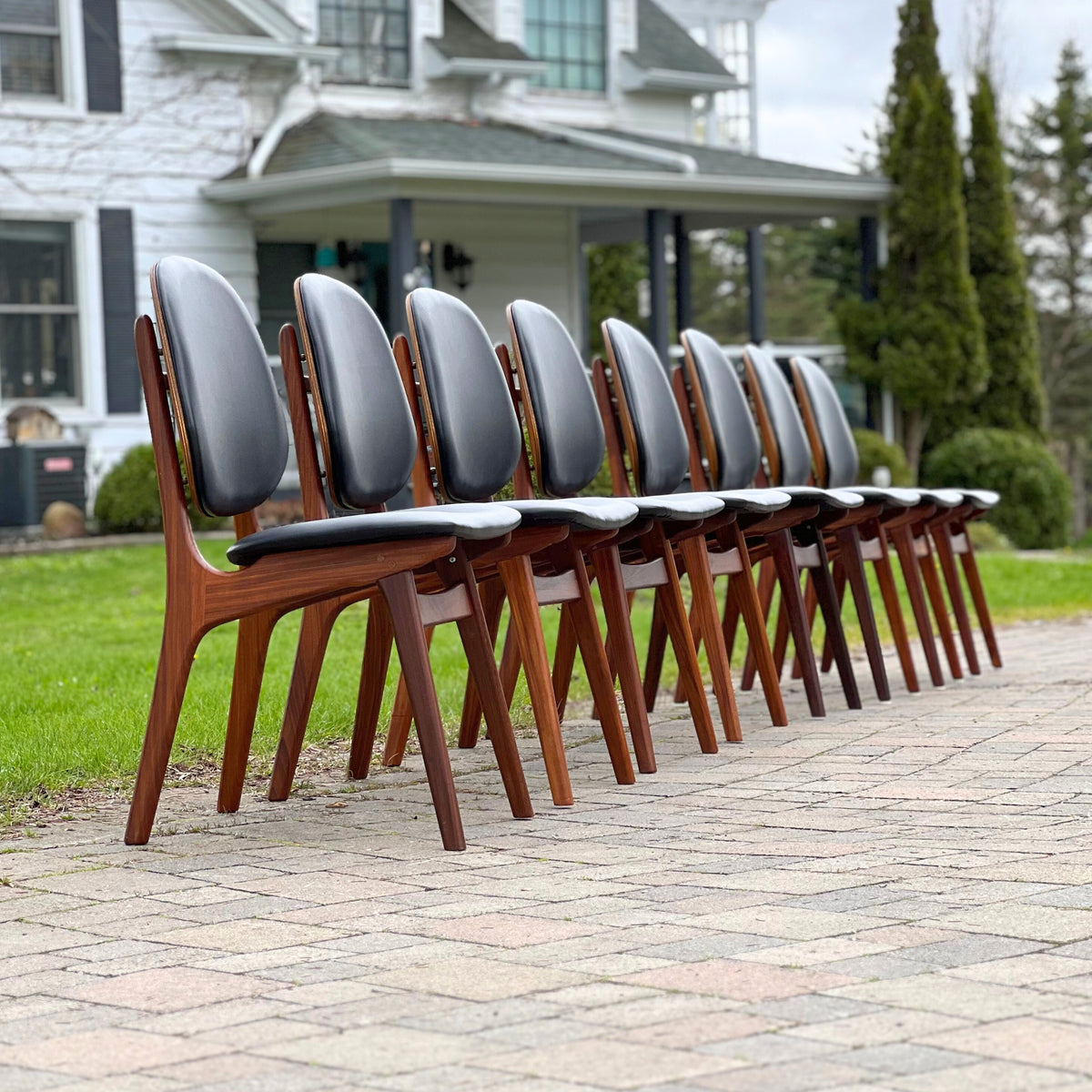 Eight Danish Dining Chairs by Arne Hovmand Olsen
