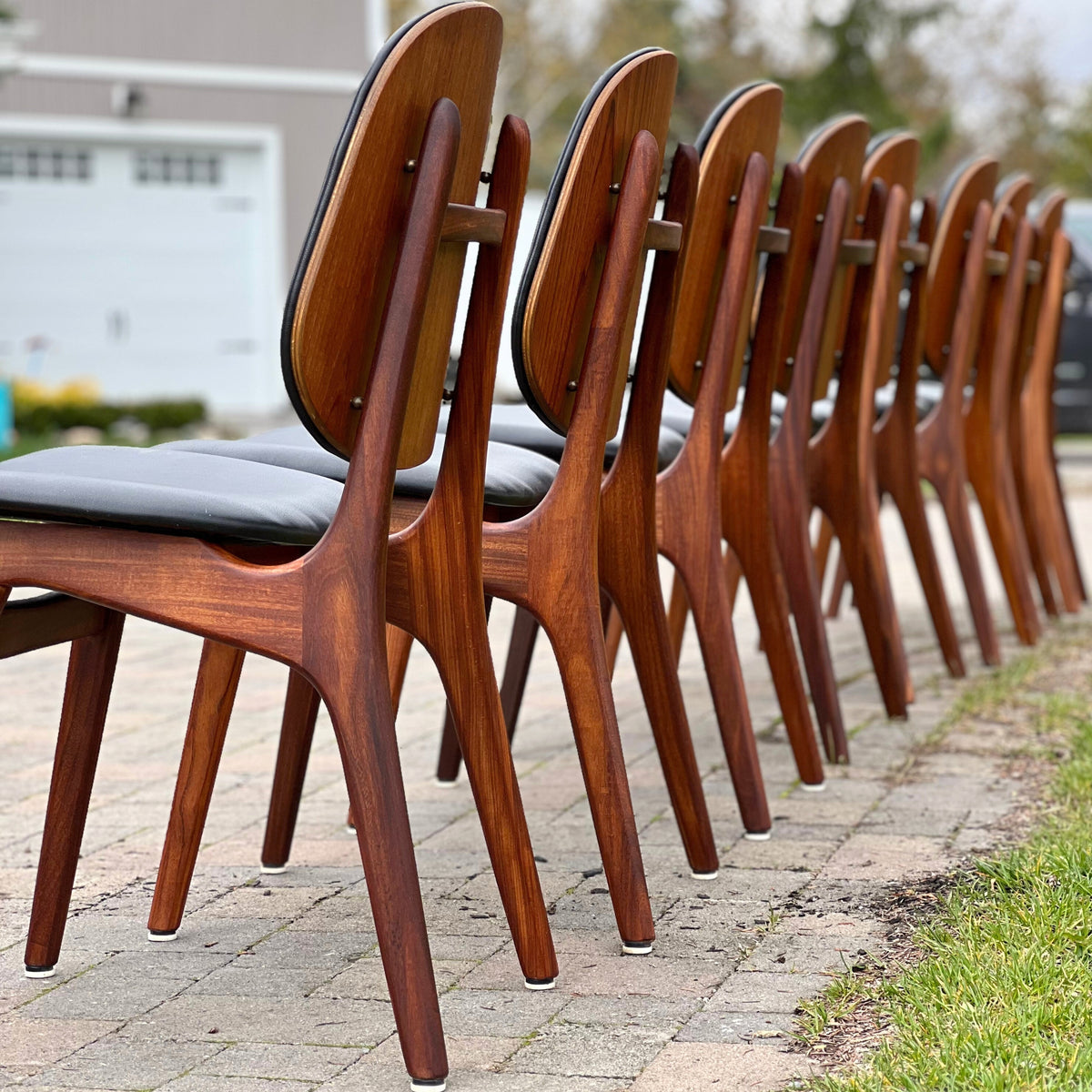 Eight Danish Dining Chairs by Arne Hovmand Olsen