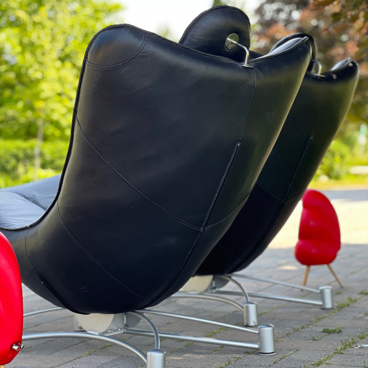 Pair of Black Leatherette Lounge Chairs