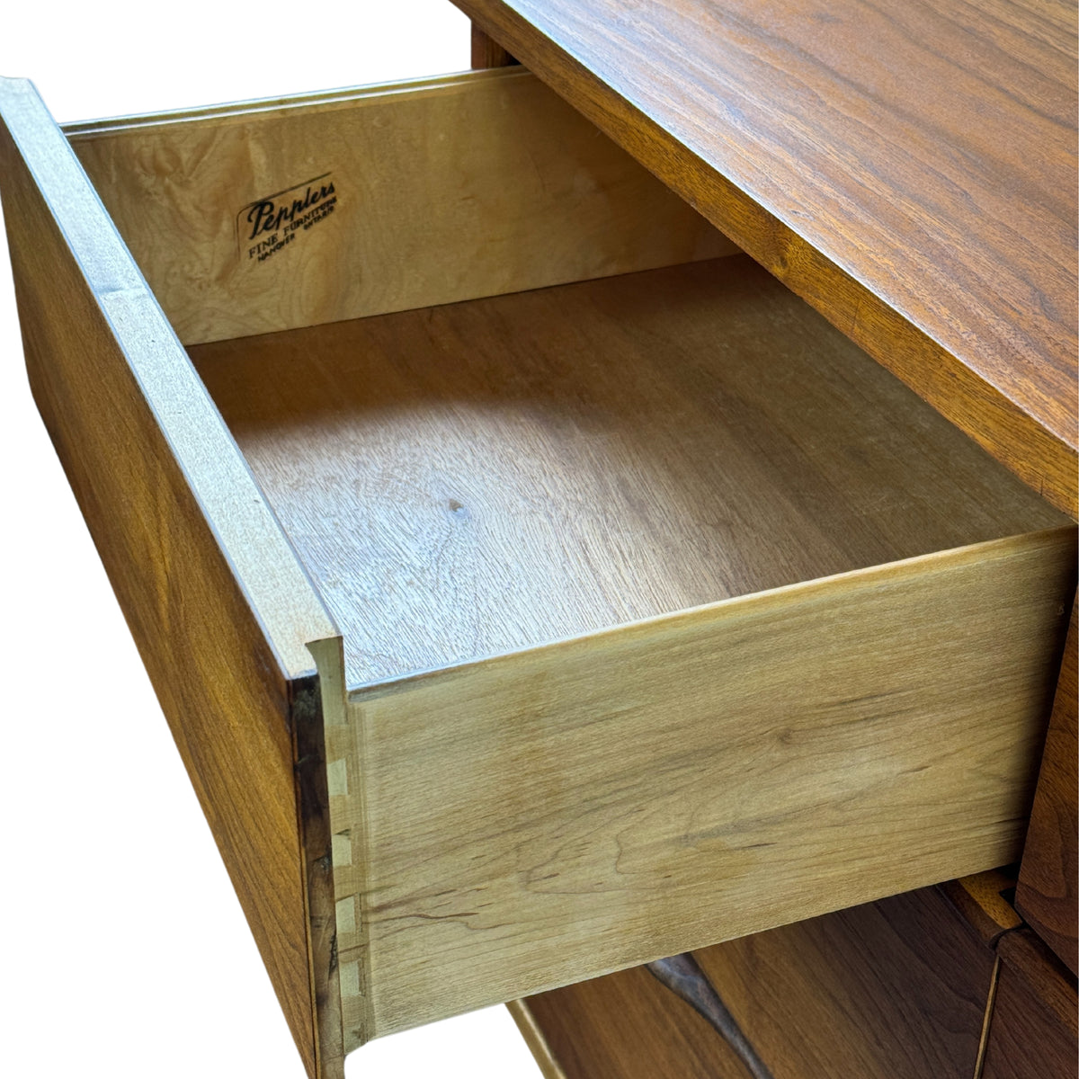 Walnut Nine Drawer Dresser by Peppler