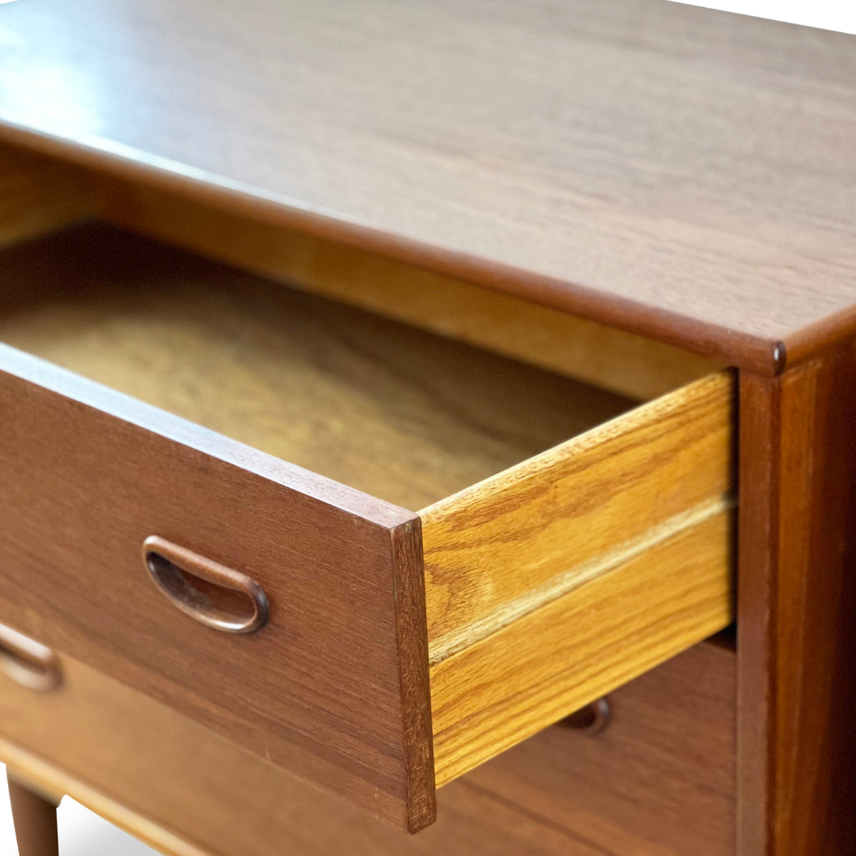 Pair of Teak Three Drawer Nightstands by R. Huber