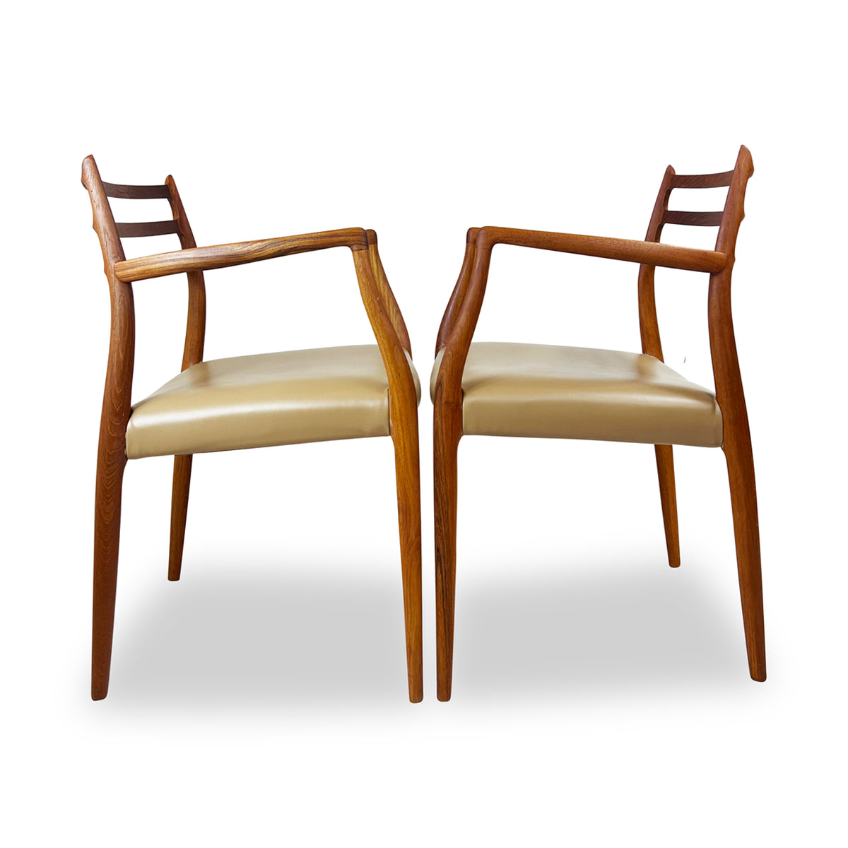 Pair of Moller Model 62 Arm Chairs