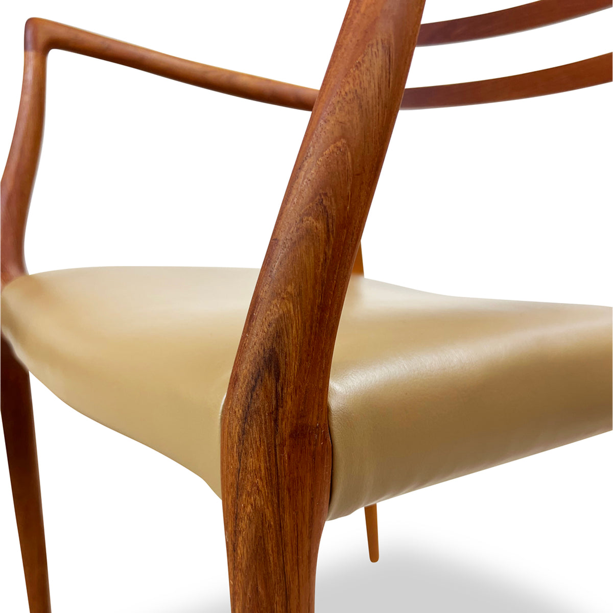 Pair of Moller Model 62 Arm Chairs