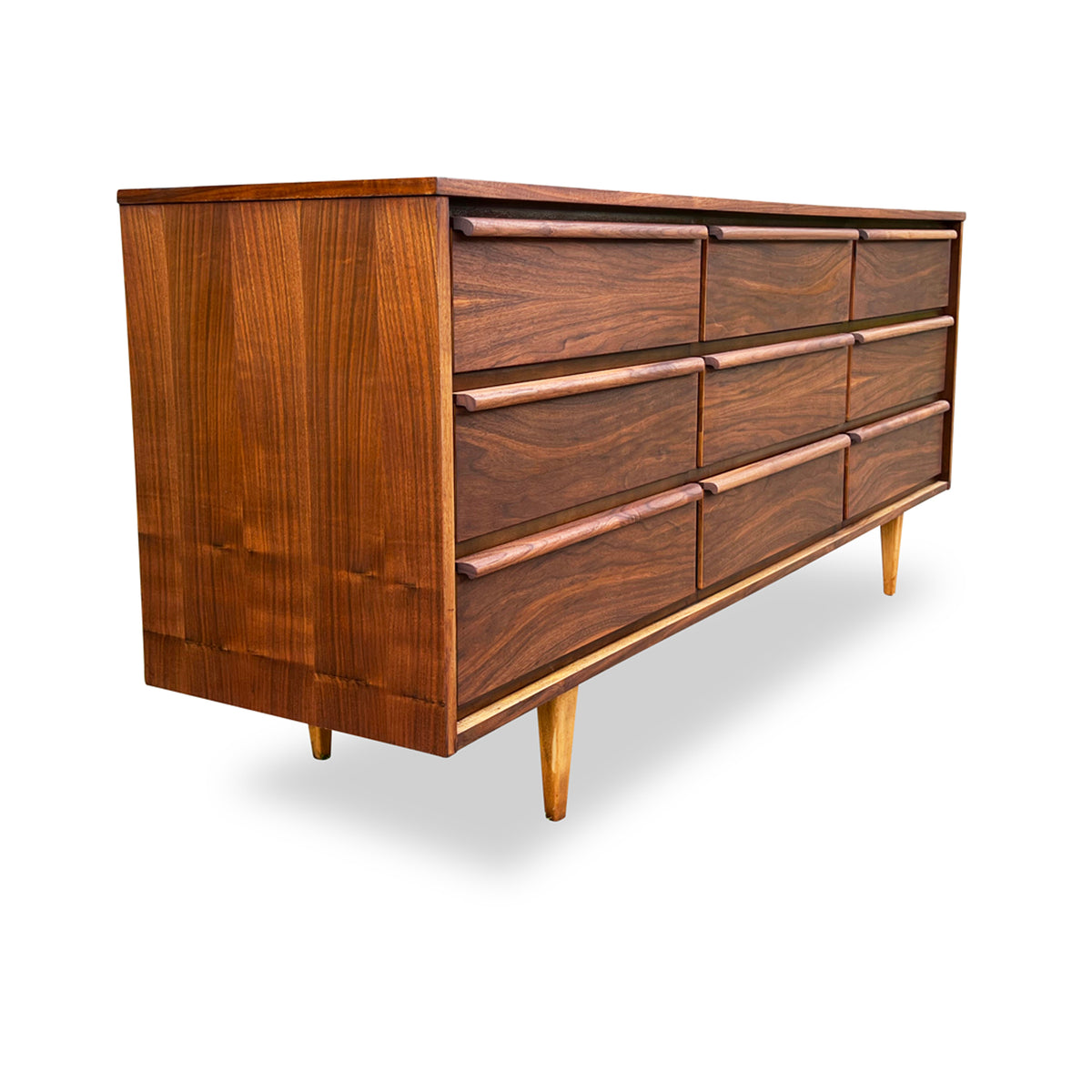 Walnut Nine Drawer Dresser by HPL