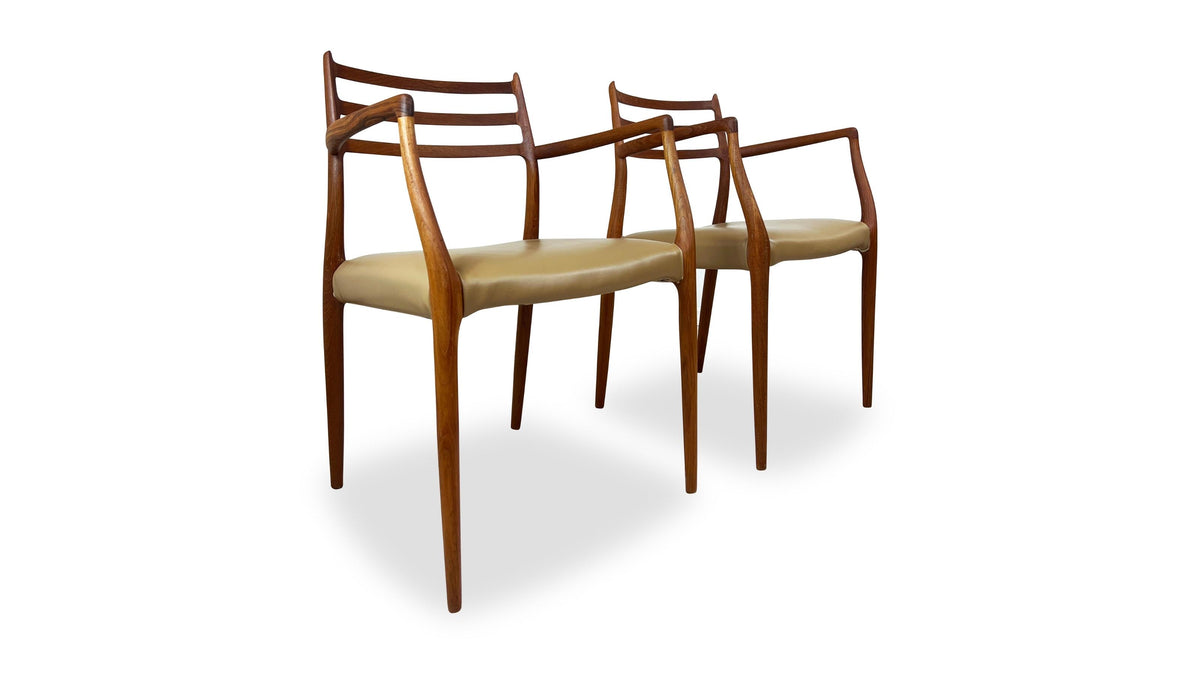 Pair of Moller Model 62 Arm Chairs
